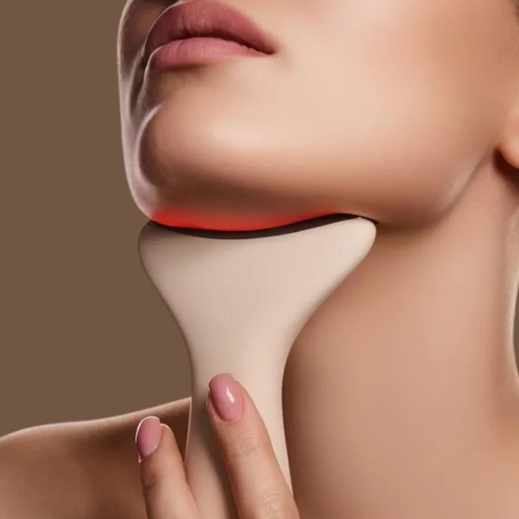 Masseur facial Orgezz™ vibrant avec chaleur pour détendre la peau